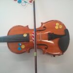 Escena de clase de violín